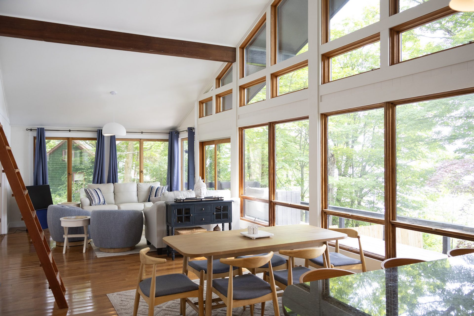 Open-concept living room with lake views